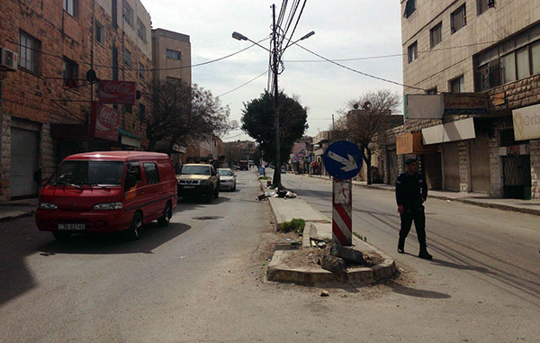 A security officer is seen in the area where seven terrorists were killed by specialised security forces in the northern city of Irbid on Wednesday (photo by Muath Freij)